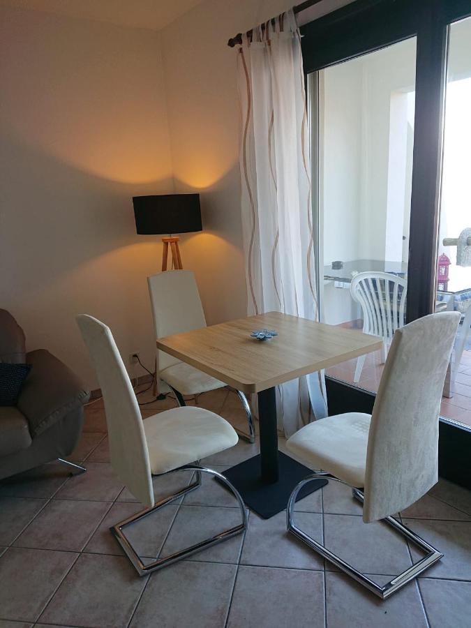 1 Zimmer Apartment Mit Seesicht Und Pool Gambarogno Esterno foto